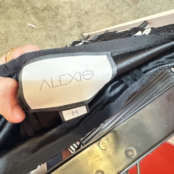 Alexis Chic Black Lace Pants with White Floral Design. Size Medium. - Picture 4 of 4